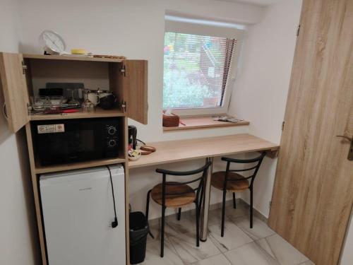 Kuchyň nebo kuchyňský kout v ubytování Apartmán LUKA 3