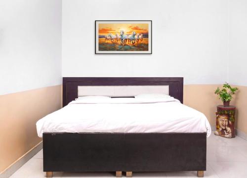 Katil atau katil-katil dalam bilik di Hotel Sunrise Inn