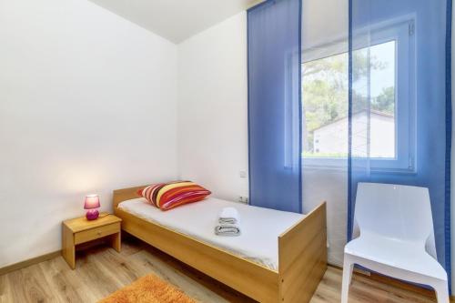 Ένα ή περισσότερα κρεβάτια σε δωμάτιο στο Casa Verde