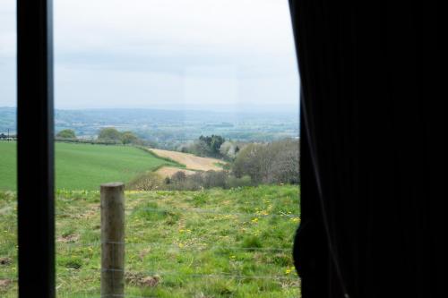 a view of a field from a window at Hanley House in Tenbury