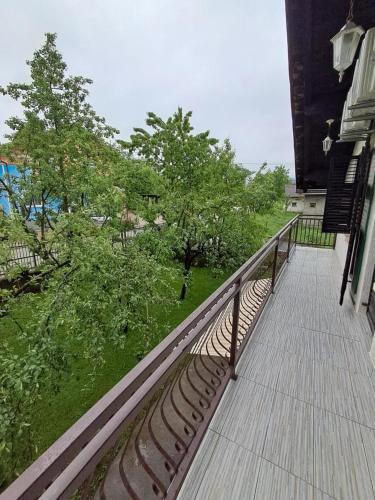 a balcony of a house with a view of a yard at Kuca za odmor Amber in Bihać