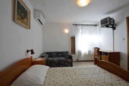 Posteľ alebo postele v izbe v ubytovaní House Rahela