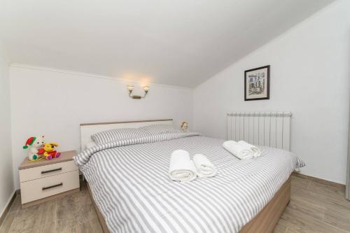 Posteľ alebo postele v izbe v ubytovaní Beautiful Apartment Aleks
