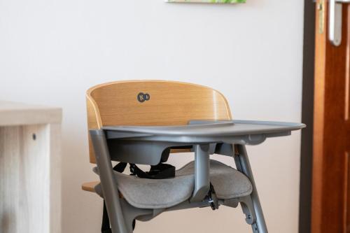 a chair with a desk on top of it at Landmar Costa los Gigantes Family Resort in Puerto de Santiago