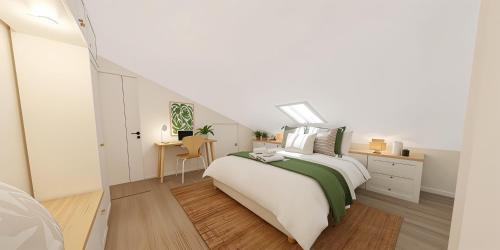 a white bedroom with a bed and a desk at Sítio 4 in Nazaré