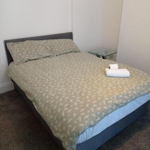 a bed in a small room with a bed sidx sidx sidx at Double-Bedroom in the Heart of Salford Manchester Perfect for Short Stays LT2 in Manchester