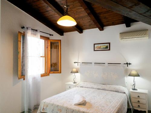 Ένα ή περισσότερα κρεβάτια σε δωμάτιο στο Agriturismo Guparza