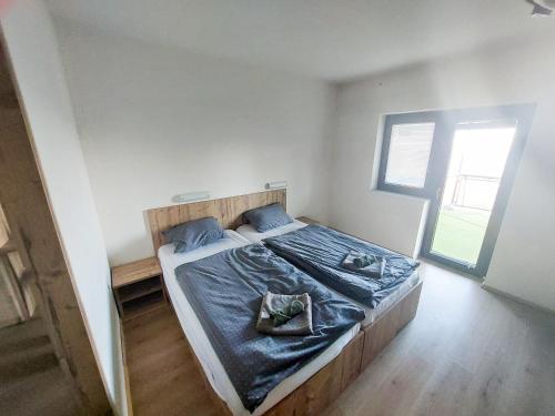 Postel nebo postele na pokoji v ubytování Planinski dom Gore
