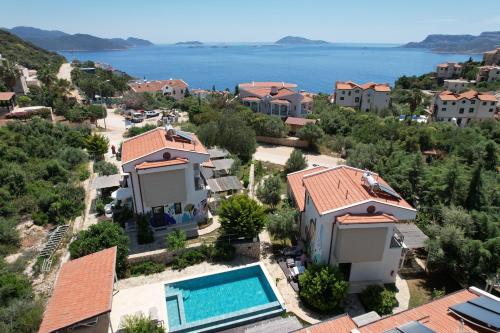 an aerial view of a villa with a swimming pool at Sea Garden Kaş Hotel in Kas