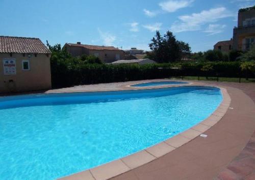 PALMERAIE 412- piscine en résidence-clim-wifi