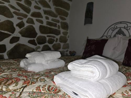 Ένα ή περισσότερα κρεβάτια σε δωμάτιο στο Casa da Tia Outra