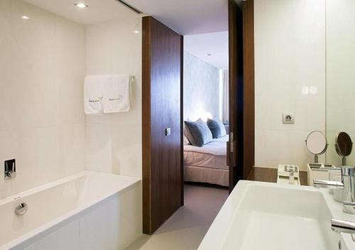 Ванная комната в Troia Design Hotel