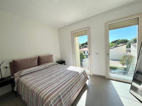 Postel nebo postele na pokoji v ubytování Venere Apartament
