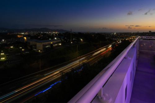 a view of a highway at night with lights at Karibea La Valmenière Hôtel in Fort-de-France