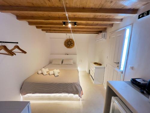Ένα ή περισσότερα κρεβάτια σε δωμάτιο στο Kamara Residence & Suites