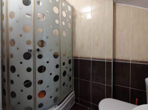 a bathroom with a shower with a toilet at enjoy in Cesme