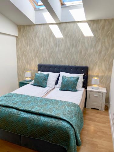 Ένα ή περισσότερα κρεβάτια σε δωμάτιο στο Apartament Wierzbna