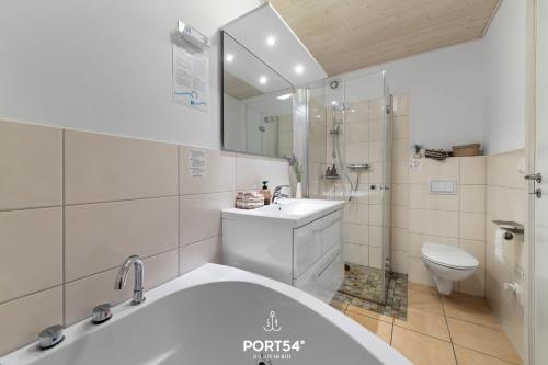 Et badeværelse på Ferienhaus Lagunenblick 42 Marina Wendtorf