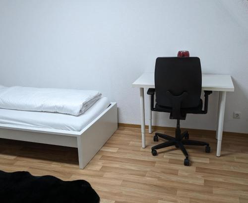 Ένα ή περισσότερα κρεβάτια σε δωμάτιο στο Meldorf Innenstadtwohnung für Monteure und Berufsreisende