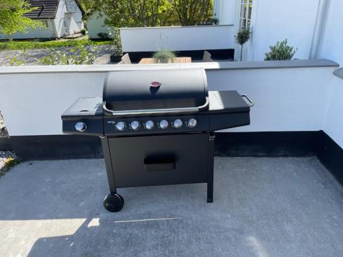 Kemudahan BBQ tersedia untuk tetamu di apartmen