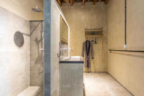 Ένα μπάνιο στο Bed en Breakfast Reijmerstok