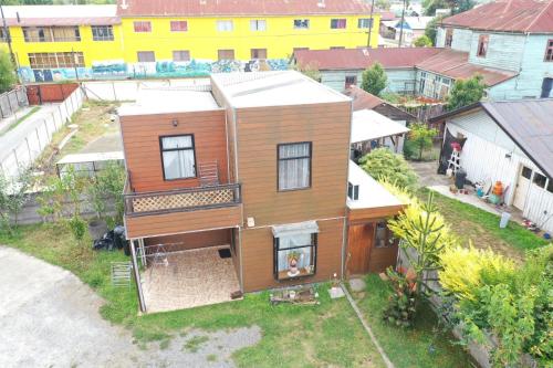 an overhead view of a house in a city at Aparthotel San Jose in San José de la Mariquina