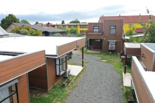 an aerial view of a neighbourhood with houses at Aparthotel San Jose in San José de la Mariquina