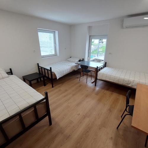 Postel nebo postele na pokoji v ubytování Rookos rooms