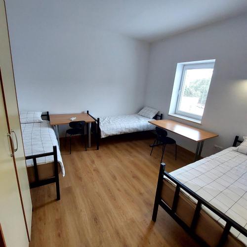Postel nebo postele na pokoji v ubytování Rookos rooms
