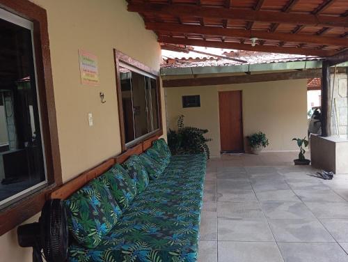 a couch sitting in the middle of a building at Chácara celebrar in Pirenópolis