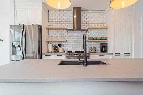 Η κουζίνα ή μικρή κουζίνα στο 851 condo in Bromont Vieux Village mountain view