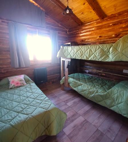 Letto o letti in una camera di Cabañas Tierra Adentro
