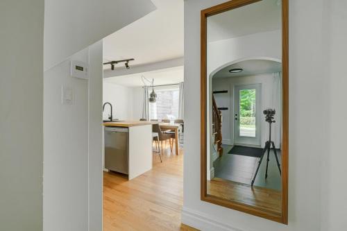 a mirror in the hallway of a home at 891 shefford 4-bedroom house in Bromont