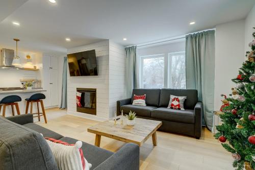 a living room with a christmas tree in it at 951 Shefford 4 bedrooms house in Bromont