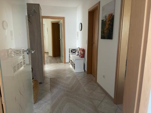 a hallway with a door open to a room at Ferienwohnung Doline in Ihrlerstein