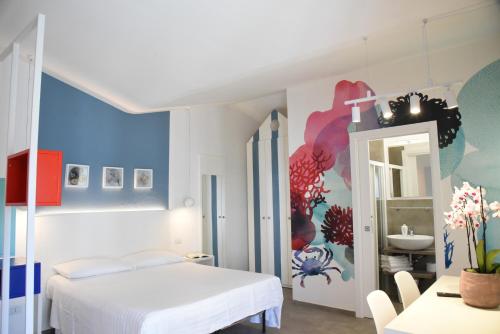 A bed or beds in a room at Daniel Apartments