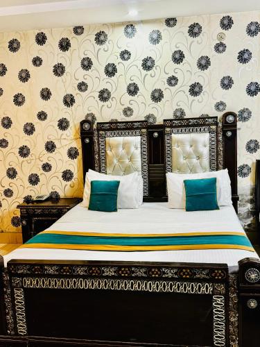 Ένα ή περισσότερα κρεβάτια σε δωμάτιο στο Hotel Visit Inn One