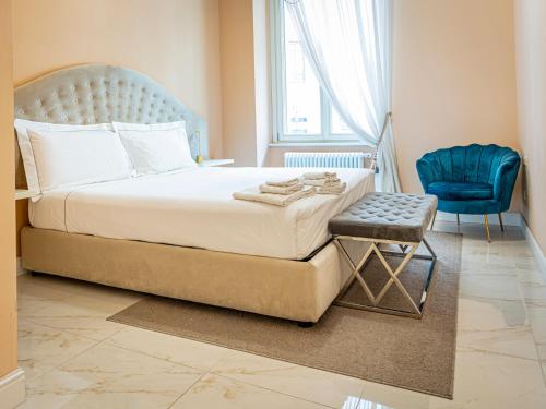 Ένα ή περισσότερα κρεβάτια σε δωμάτιο στο Luxury Sant'Ambrogio Apartment