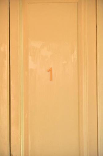 a door with the number one on it at Liberty House in Turbigo
