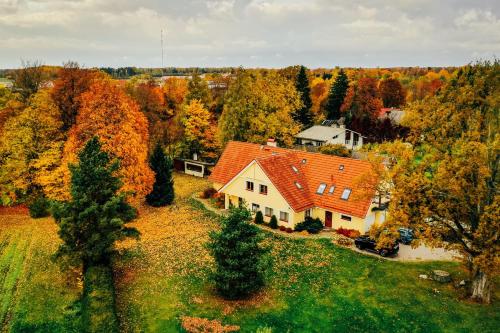 an aerial view of a house with an orange roof at Villa River Rose in Jõesuu