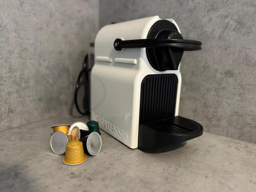 a toaster sitting on top of a counter at train station, Kahlenberg, historic, danube - Axara Housing FHG 16 in Vienna