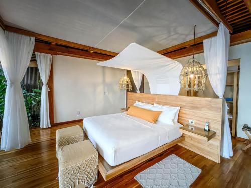 Postel nebo postele na pokoji v ubytování Lapa Rios Lodge
