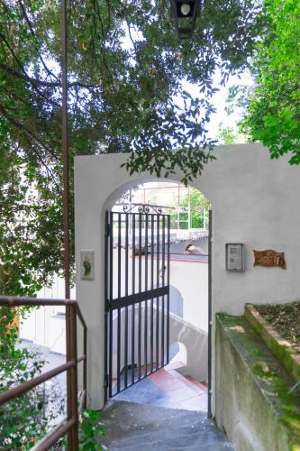 an entrance to a house with an open gate at Estate4home - Villa Carrino in Positano