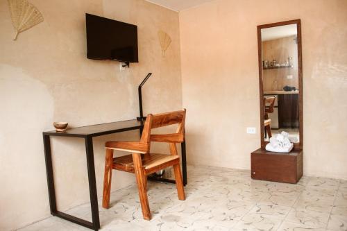 TV a/nebo společenská místnost v ubytování Hotel Casa Nudo, Mérida