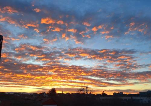 El amanecer o atardecer visto desde el departamento