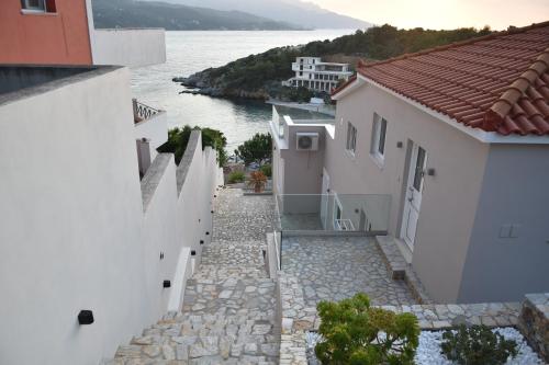 a view of the water from between buildings at Samos Endless Blue 2 in Samos