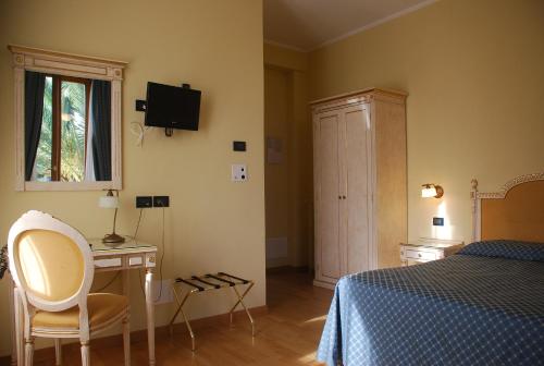 TV a/nebo společenská místnost v ubytování Hotel Primula