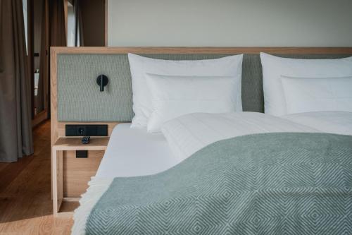 Postel nebo postele na pokoji v ubytování Hotel Niedermair