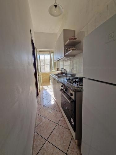 Una cocina o zona de cocina en Villetta nonna Pina