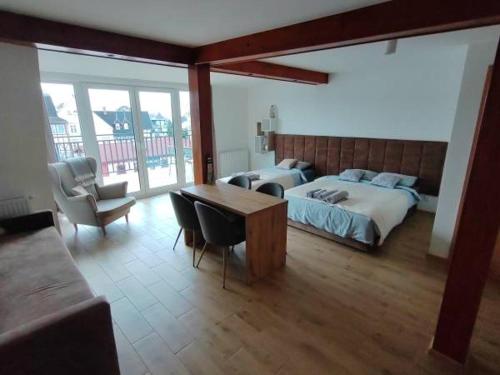 Ένα ή περισσότερα κρεβάτια σε δωμάτιο στο Bachus